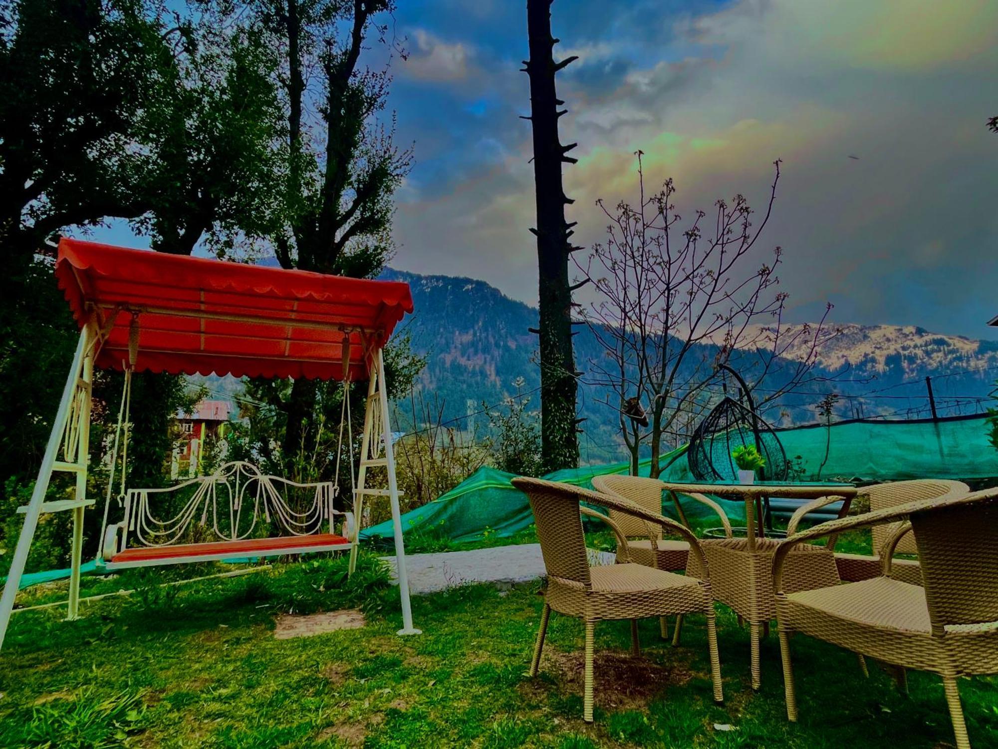 The Manu Emerald # Farmhouse # Top Selling Cottage In Manali # Peaceful Heritage Cozy Stay # Lawn With Bonfire # Most Awarded Exterior photo